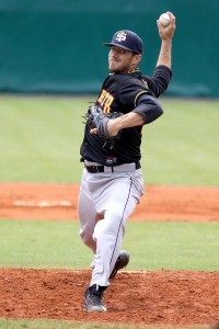 Joe Wittig (USA) works his magic on the mound and at the plate (photo by Jan Benes)